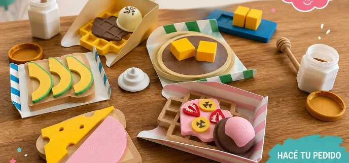 Piezas de desayuno de juguete, entre ellas tostadas, waffles, queso y dulces